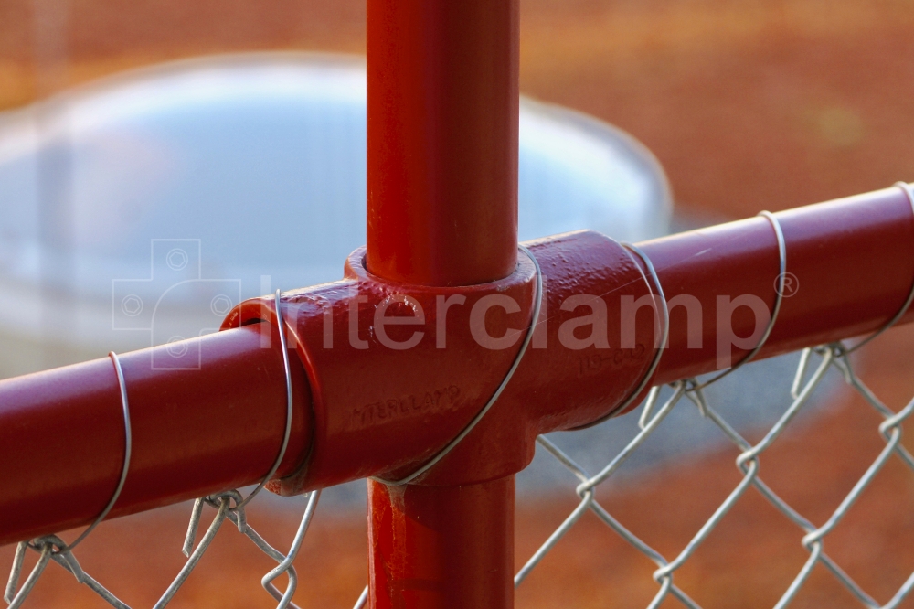 Close-up of Interclamp tube clamp fittings forming secure guardrails on the balconies of a Swiss student accommodation block, providing reliable protection for residents.